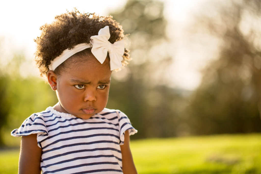 A precious little girl pouting, looking sad. It's easy to visualize her thriving on the HSe web app beginning well before K-12